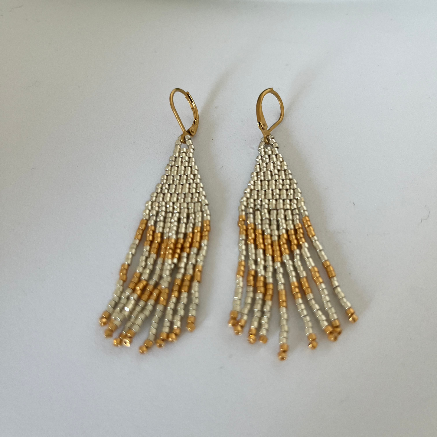 Aretes medianos colgantes